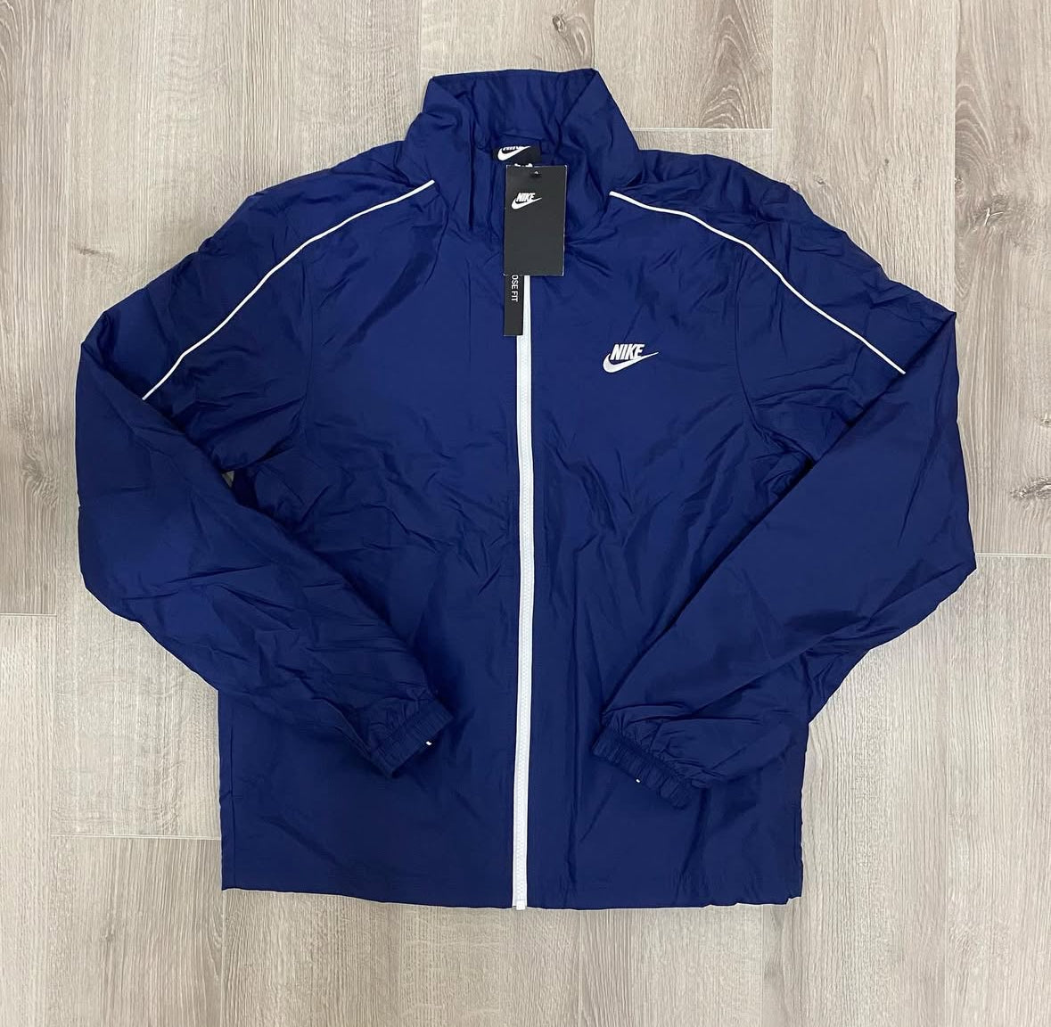 Conjunto NK Tracksuit Relíquia Azul Marinho