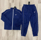 Conjunto NK Tracksuit Relíquia Azul Marinho