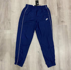 Conjunto NK Tracksuit Relíquia Azul Marinho