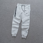 Calça NK Tech Fleece Cinza