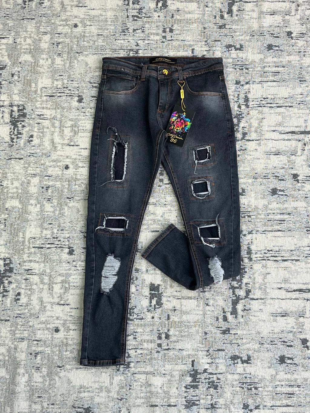 Calça Jeans Jogador com Rasgos